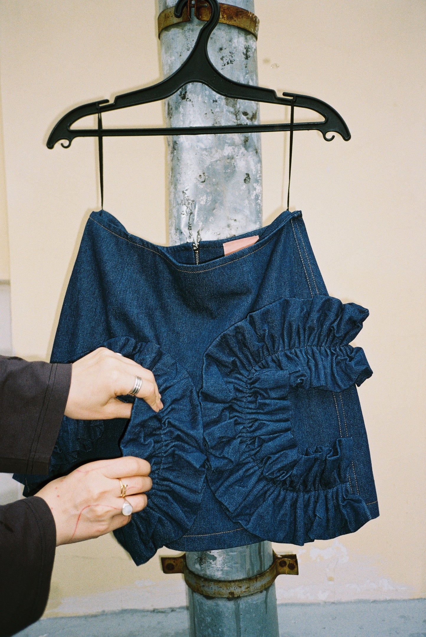 Denim mini skirt with ruffles