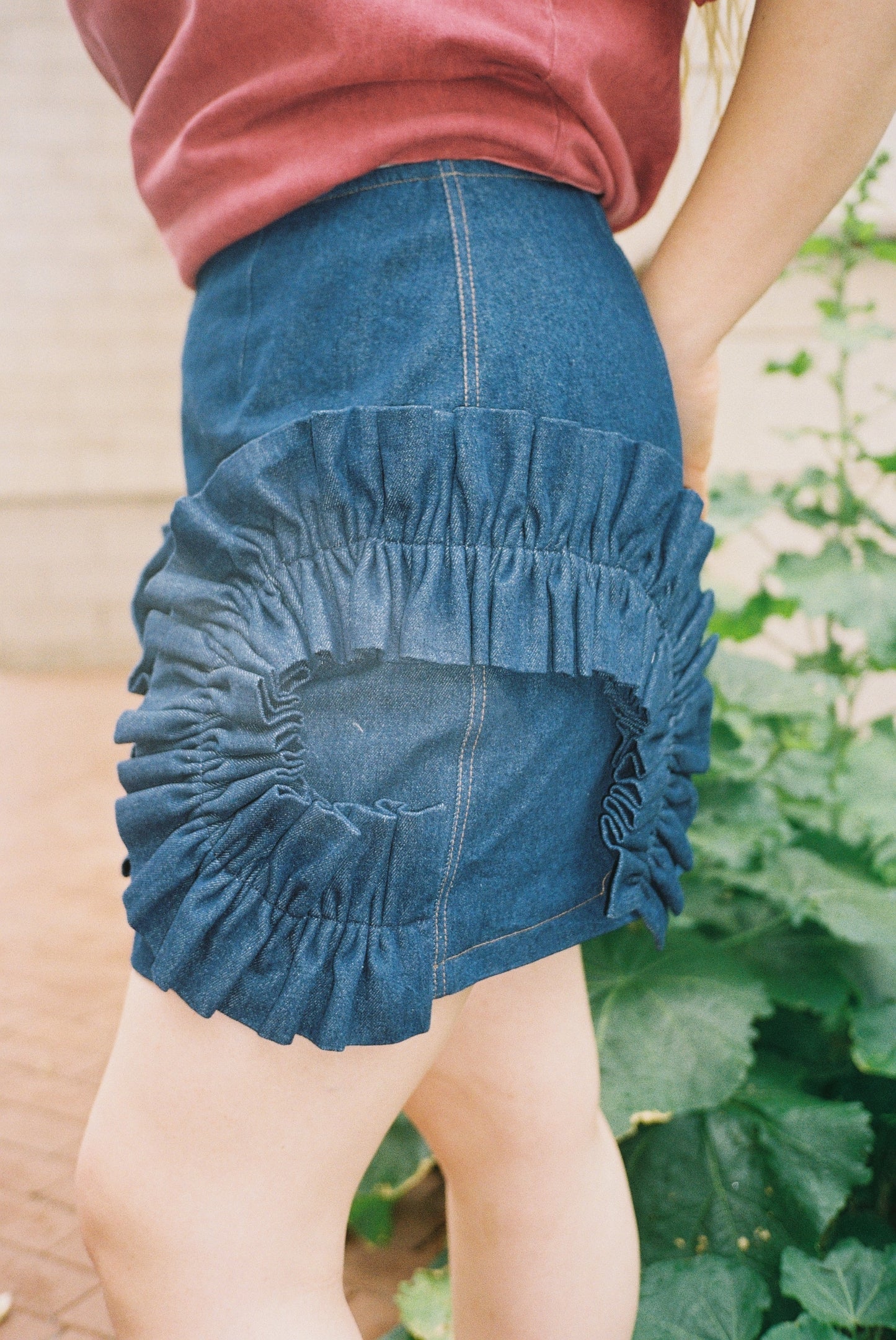 Denim mini skirt with ruffles