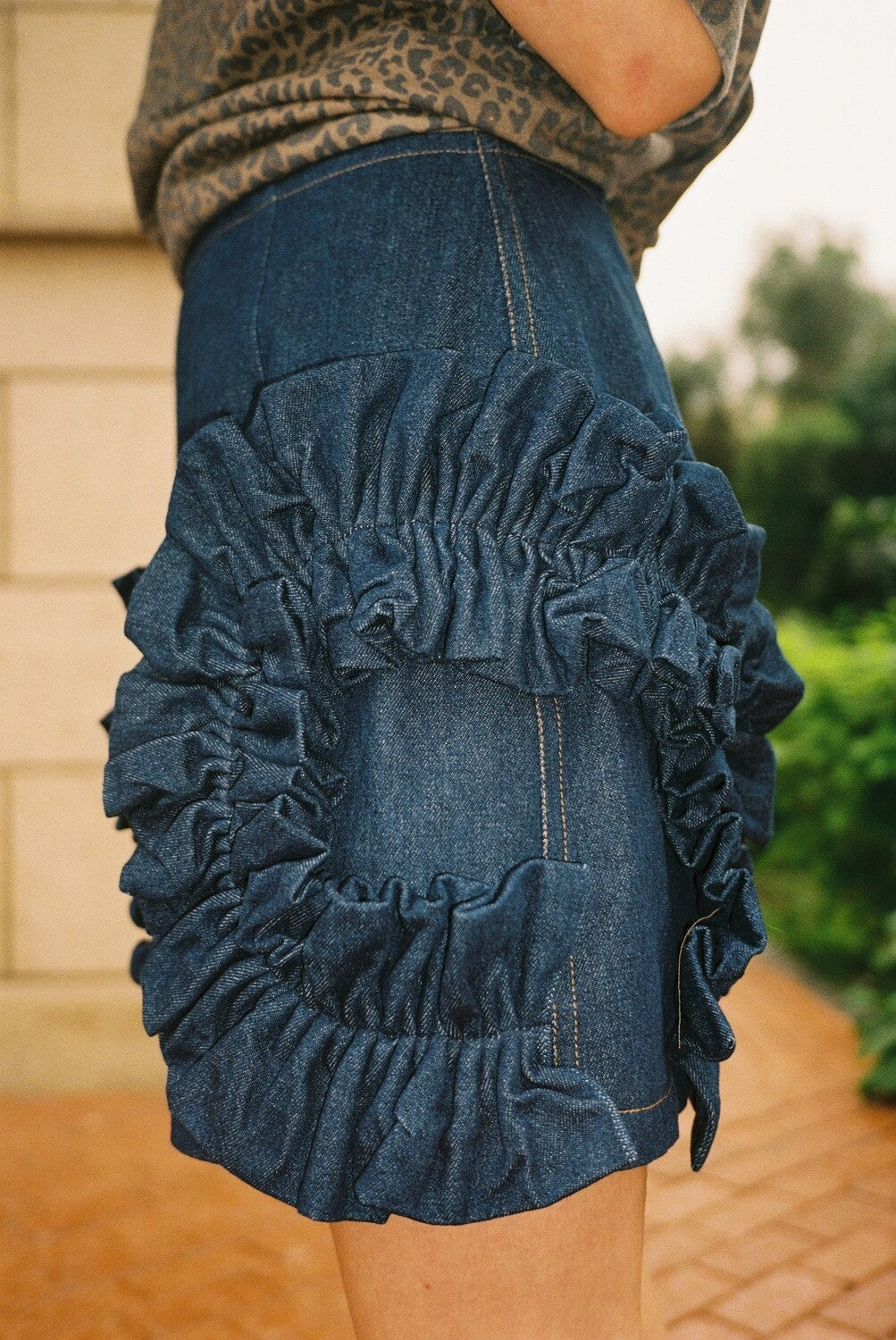 Denim mini skirt with ruffles