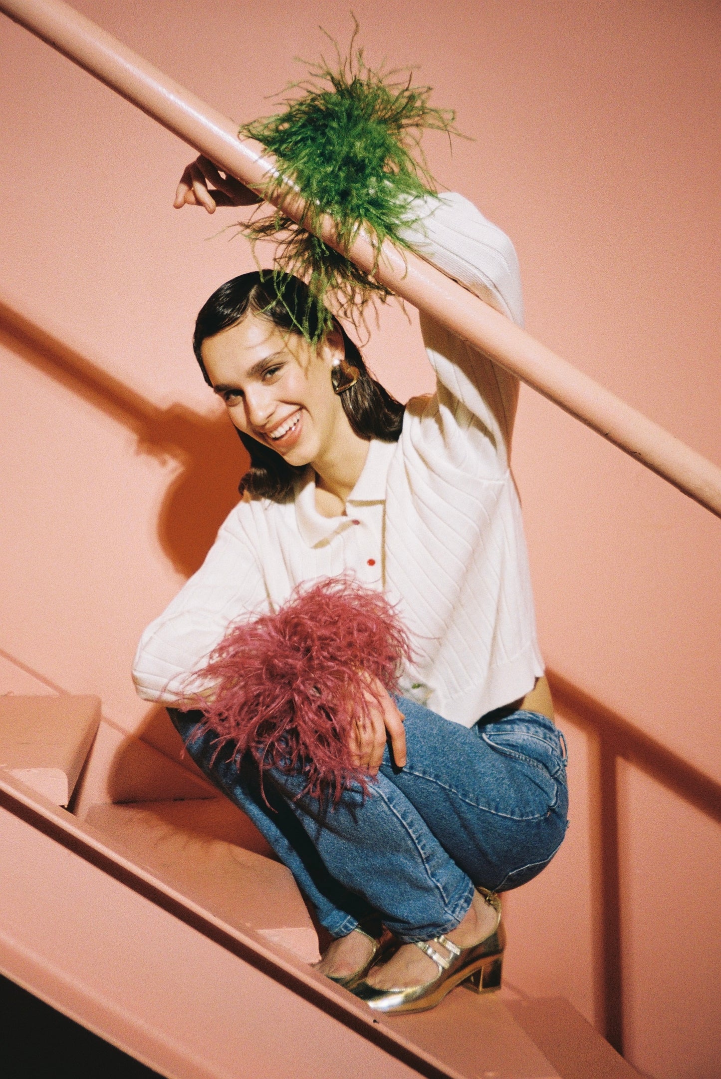 Cardigan with colorful feathers