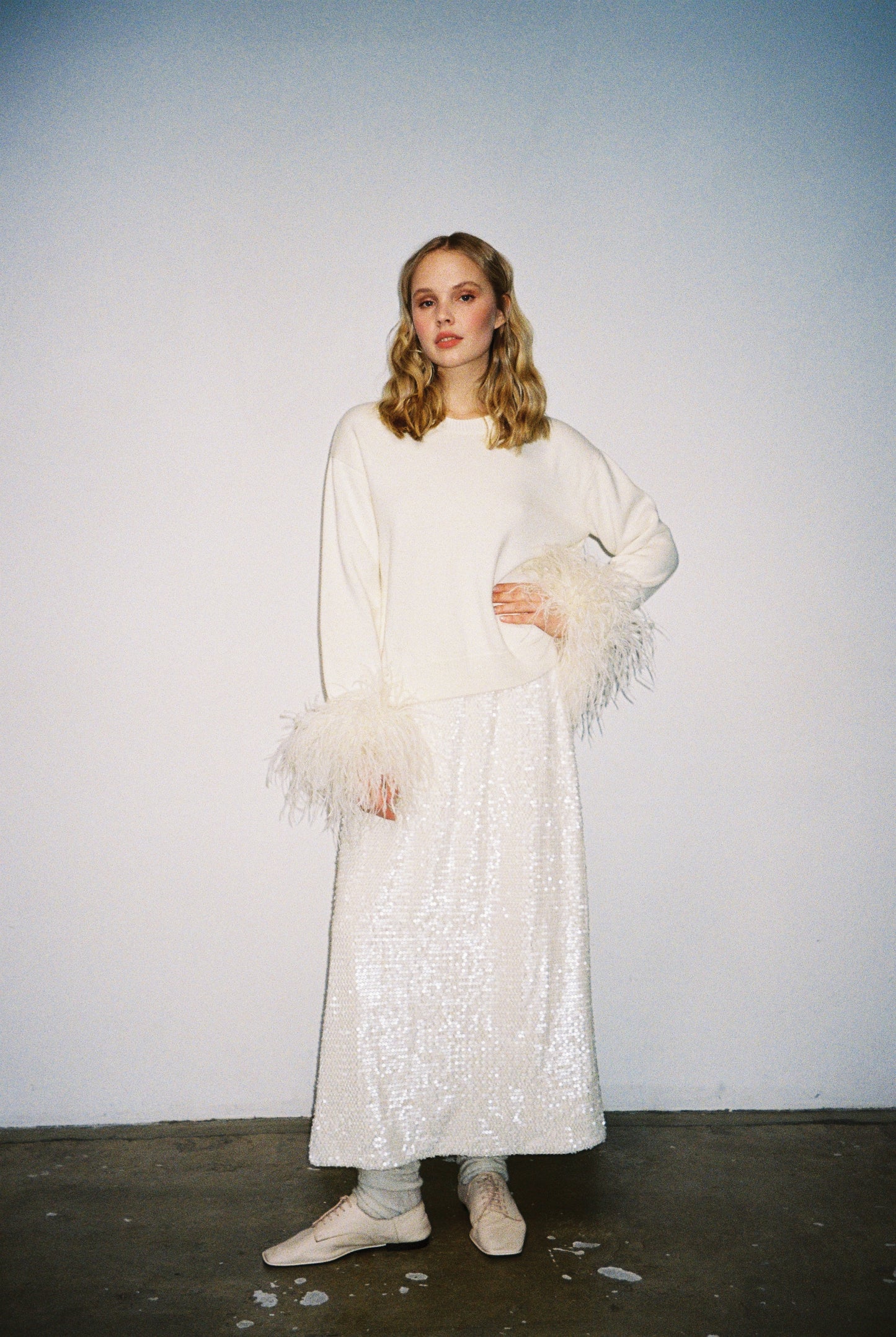 Jumper with feathers