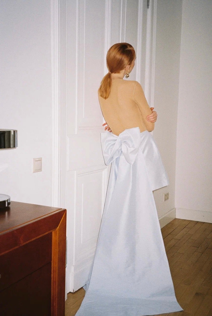 Skirt with bow and train
